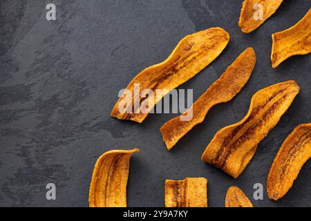 Thin slices of ripe plantain - Musa x paradisiaca. Stock Photo