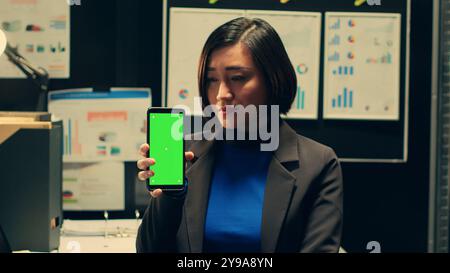 Private Investigator Detective Using Camera In Car Stock Photo - Alamy