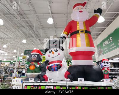 Inflatable lawn Christmas decorations on display at a Menards home improvement store Stock Photo