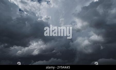 Dramatic dark storm clouds in sky background Stock Photo