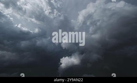 Dramatic dark storm clouds in sky background Stock Photo
