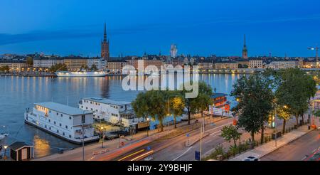 Stockholm, Sweden - 4 October 2022: A captivating view of Stockholm's Old Town, showcasing colorful buildings and historic charm at twilight Stock Photo