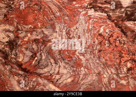 Beautiful color texture pink orange red yellow white color geological rock formations in city of Petra, Jordan Stock Photo