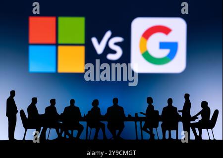 CALIFORNIA, USA, OCTOBER 10, 2024: Microsoft vs Google Business Strategy Session. A dynamic discussion between executives, company vision displayed on Stock Photo