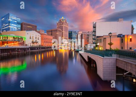 Milwaukee, Wisconsin, USA. Cityscape image of downtown Milwaukee, Wisconsin, USA with reflection of the skyline in Milwaukee River at summer sunset. Stock Photo