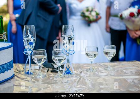 Celebration Toasts at a Joyous Wedding Ceremony with Beautiful Decor. Stock Photo