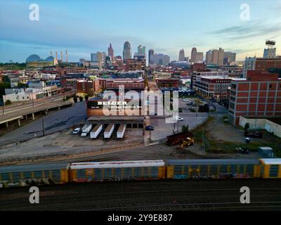 aerial view of train in front of kansas city skyline Stock Photo