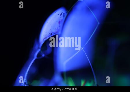 Red and purple fluid pattern, fluid background, plasma, fluid movement, red sphere, smooth movement, one bright line in the dark background Stock Photo