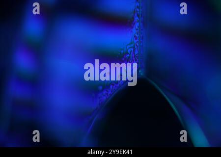 Red and purple fluid pattern, fluid background, plasma, fluid movement, red sphere, smooth movement, one bright line in the dark background Stock Photo