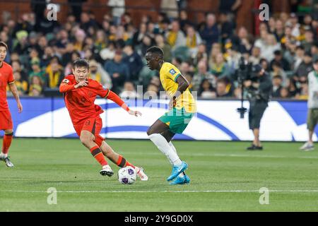 Adelaide Oval, Adelaide, Australia 10th October2024, International, World Cup Qualification, AFC Australia vs China PR,  China PR; Yuanyi LI moves in to intercept Socceroo; Thomas DENG   Credit; Mark Willoughby/ALAMY Live News Stock Photo