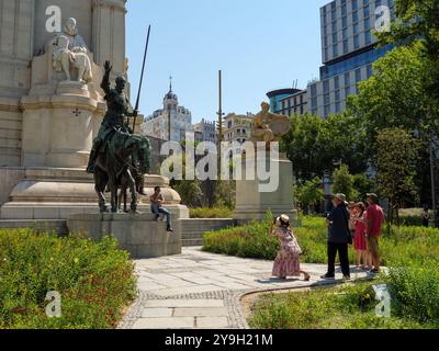 Tourists taking photos at the Don Quixote monument in Plaza Espana, Madrid, Spain Stock Photo