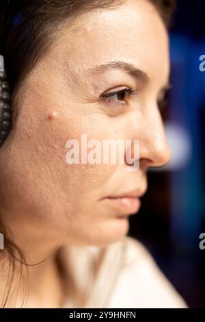 Reflective developer debating how to design and develop software applications. Puzzled IT specialist trying to come up with solutions while implementing and maintaining company systems, close up Stock Photo