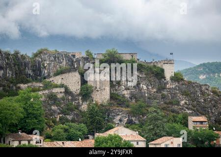 Medieval Village of Trigance in the Verdon Region, with 11th century Château de Trigance and surrounded by Scenic Provençal Countryside on cloudy day Stock Photo