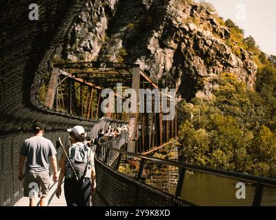 bridge along train tracks to tunnel in Harpers Ferry West Virginia Stock Photo