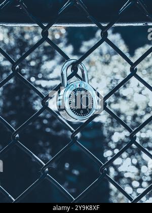 lock on fence of bridge over river in Harpers Ferry West Virginia Stock Photo