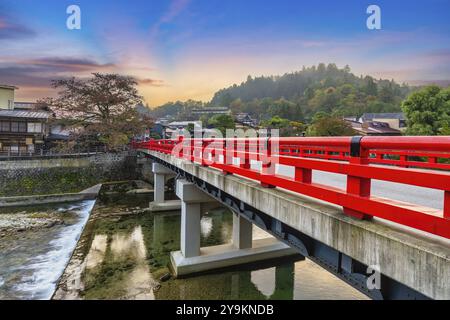 Takayama Gifu Japan, sunrise city skyline at Nakabashi red bridge and Miyagawa river in autumn season Stock Photo