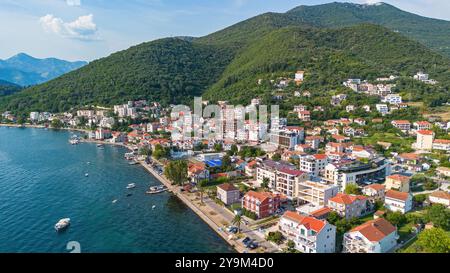 Aerial view of the waterfront orthodox church of Saint Roch of Donja Lastva in Tivat in the Bay of Kotor, Montenegro Stock Photo