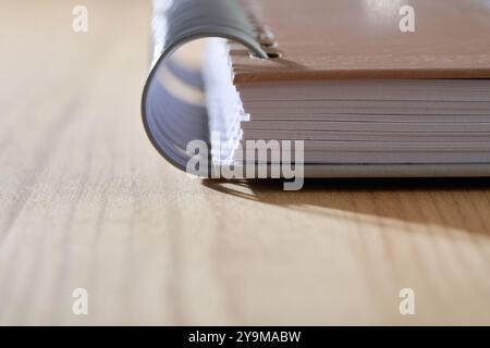 Close up of spiral brown notebook Stock Photo