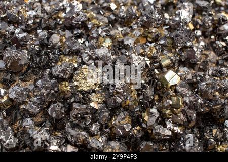 Pyrite mineral flower black and golden color soft focus close up, abstract pattern Stock Photo