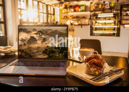 remote working at stylish coffee shop in the centre of Bangkok Stock Photo