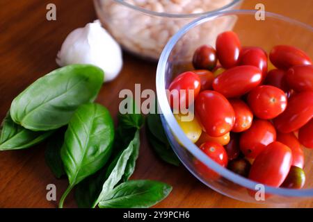 Trendy Garlic Tomato and White Beans Dish Stock Photo