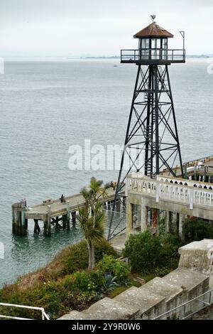 Historic metal prison guard tower on Alcatraz Island with The Bay behind. Stock Photo