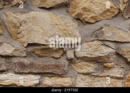 Stone wall showing rough surface texture background in Vysehrad Prague Stock Photo