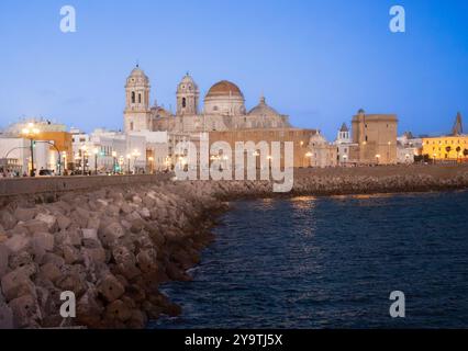 Cadiz Cathedral at sunset on water Stock Photo