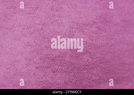 Cloth structure of jacquard pink fabric with abstract shabby texture with shades closeup, macro. Upholstery, decorative cloth structure, canvas for ho Stock Photo