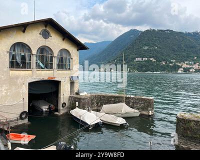 House with boat parking arrangement in basement on lake Como Stock Photo