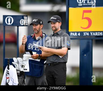 Jul 20, 2019;  Webb Simpson waits to tee off at the 5th with caddy Paul Tesori during the third round of The Open Championship golf tournament at Royal Portrush Golf Club - Dunluce Course. Portrush, Northern Ireland. Stock Photo