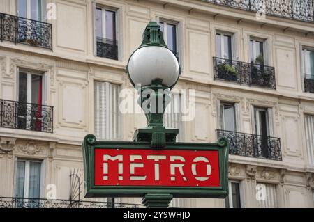 Iconic Arrival: Paris Metro's Signature Entrance Stock Photo