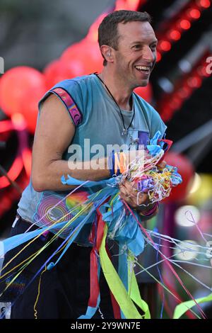 Chris Martin of Coldplay performs on NBC's 'Today' at Rockefeller Plaza on October 08, 2024 in New York City. Stock Photo