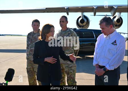 Charlotte, United States. 05 October, 2024. U.S Vice President Kamala Harris, left, and North Carolina Gov. Roy Cooper, right, deliver brief remarks to the media on the relief and recovery efforts in the aftermath of Hurricane Helene at Charlotte-Douglas International Airport, October 5, 2024 in Charlotte, North Carolina.  Credit: TSgt. Juan Paz/US Air Force Photo/Alamy Live News Stock Photo