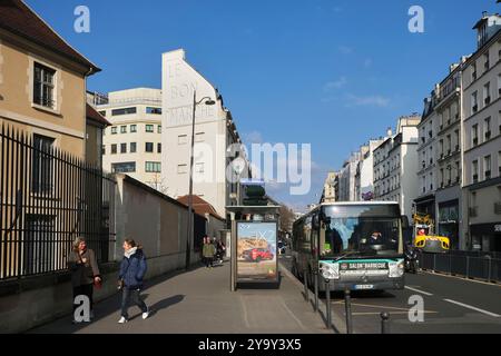 France, Paris, rue de Sevres, the Bac-Saint Placide bus station near Le Bon Marche department store Stock Photo