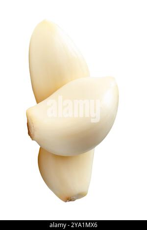 Peeled garlic cloves in stack are isolated on white background with ...