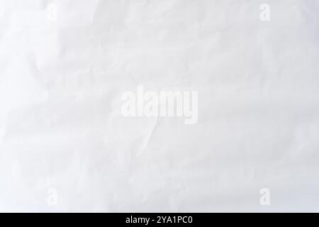 Top view and full frame of wrinkled or crumpled white stencil paper texture is used for wrinkled or crumpled white paper background texture in decorat Stock Photo