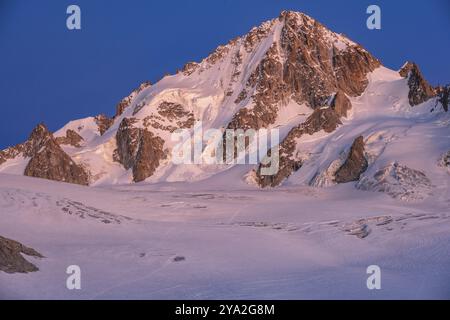 High alpine mountain landscape at sunset, Glacier du Tour, glacier and mountain peak, summit of the Aiguille de Chardonnet, Chamonix, Haute-Savoie, Fr Stock Photo