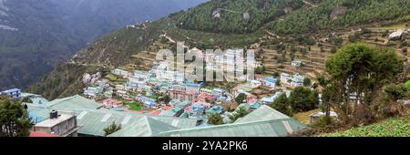 Namche Bazaar village on the way to Everest Base. Nepal. Asia. Web banner in panoramic view Stock Photo