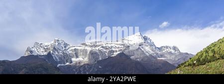 Namche Bazaar village on the way to Everest Base. Nepal. Asia. Web banner in panoramic view Stock Photo