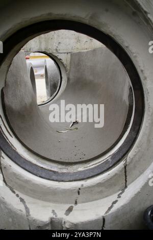 View into a sewage shaft from the perspective of the sewer Stock Photo