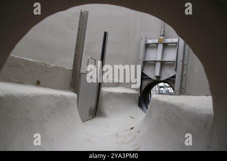 View into a sewage shaft from the perspective of the sewer Stock Photo