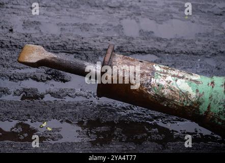 A Dirty And Grungy Jackhammer Or Pneumatic Drill Or Demolition Hammer Stock Photo