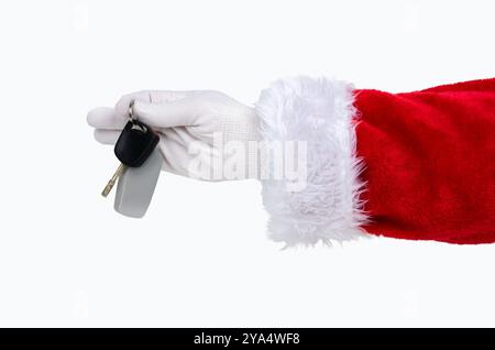 Shot of an Santa Claus hand giving a car key isolated on a white background Stock Photo