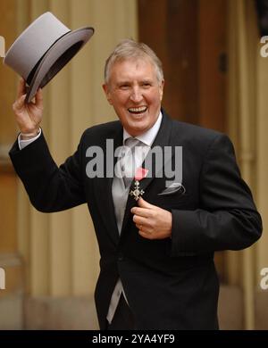 File photo dated 24/02/06 of BBC Radio 2 veteran DJ Johnnie Walker in the quadrangle of Buckingham Palace in London, after collecting an MBE for services to broadcasting. Terminally-ill DJ Johnnie Walker has said he is 'not worried about dying', but has shared his fears about what his last moments may be like due to his health condition. Issue date: Saturday October 12, 2024. Stock Photo