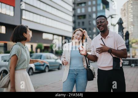 Multicultural business team engaging in outdoor meeting Stock Photo