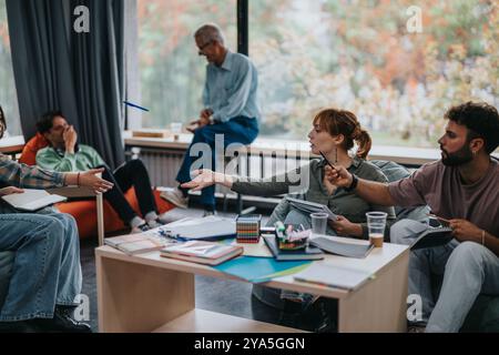 Professor engaging with students in collaborative learning session Stock Photo