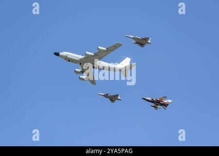 Boeing RC-135W, Saab Gripen, Dassault Mirage & Panavia Tornado, performing a flypast celebrating the 75th anniversary of NATO at RIAT 2024. Stock Photo