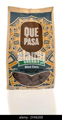 Winneconne, WI - 3 August 2024: A package of Que Pasa organic blue corn volcanic stone ground tortilla chips on an isolated background. Stock Photo