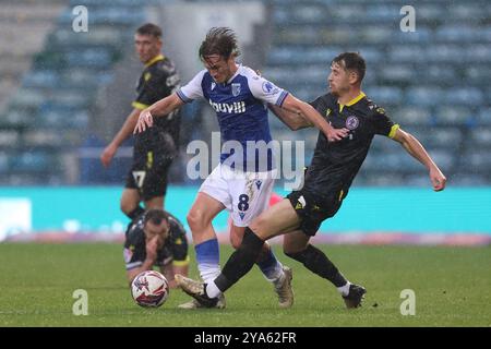 Gillingham’s Armani Little (left) and Accrington Stanley’s Donald Love during the Sky Bet League Two match at Priestfield Stadium, Gillingham. Picture date: Saturday October 12, 2024. Stock Photo